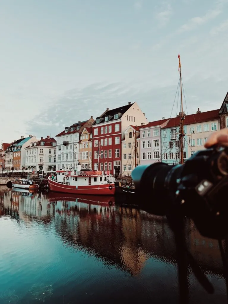 A photo of a camera capturing photos of Nyhavn, Copenhagen