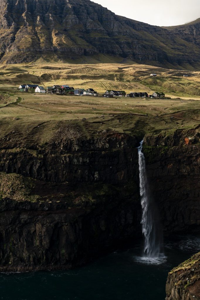 A village and waterfall in the Faroe Islands